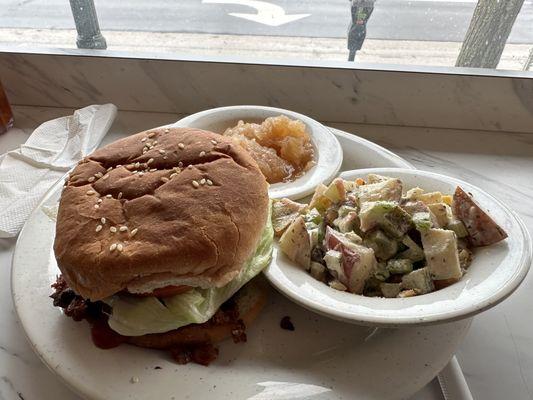 Veggie burger, potato salad and apple sauce