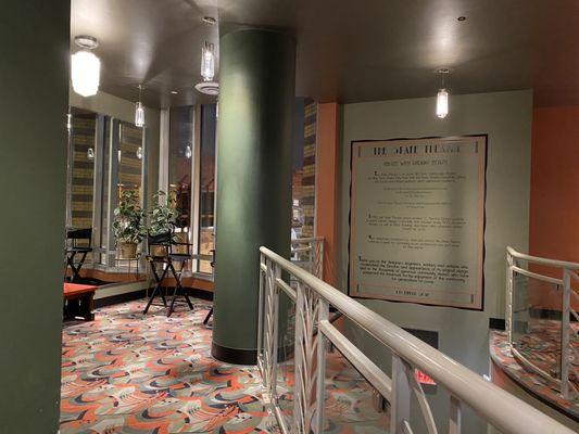 Sitting area in the upstairs lobby. The theatre serves alcohol so this is a place to chill before or after a show.