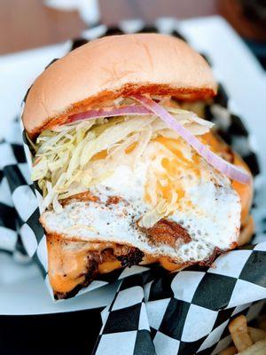 The Golden Burger with cheese + egg. Seriously one of the best burgers in town. Definitely order this!  https://www.goldentigeratx.com/