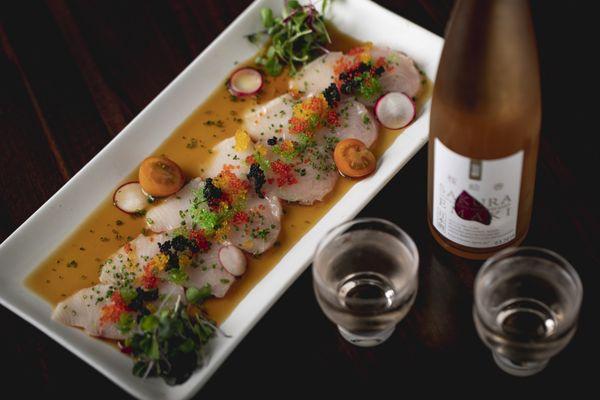 Yellowtail Carpaccio paired with Sakuna Rose Sake