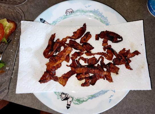 Bacon from the sandwich I cooked at home in the air fryer.