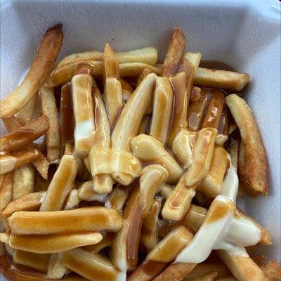 Fries with gravy and cheese