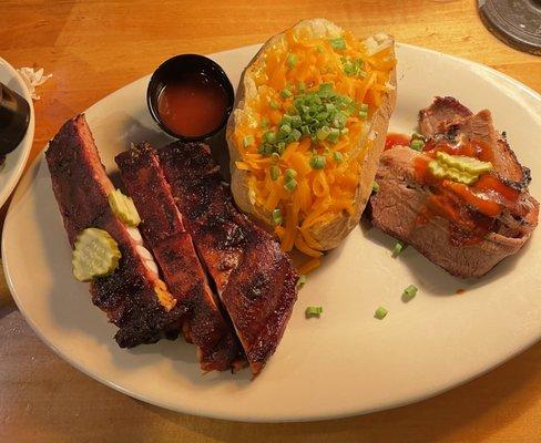 Rib and brisket platter w/ loaded baked potato (supposed to have bacon bits, had to ask)