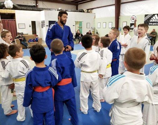 Coach Alaa teaching our kids Judo class