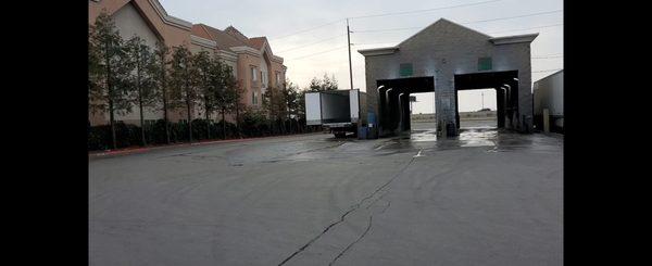 Trailer washout area on the left exterior of the wash bay