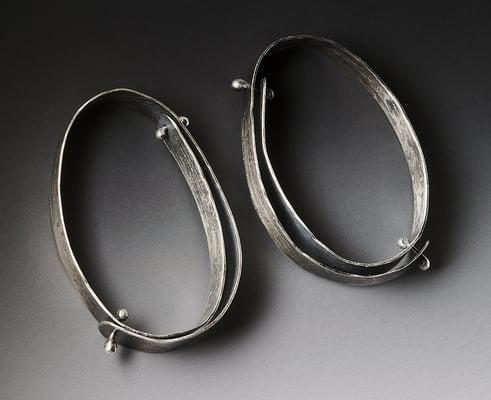 Silver earrings by Lisa Colby