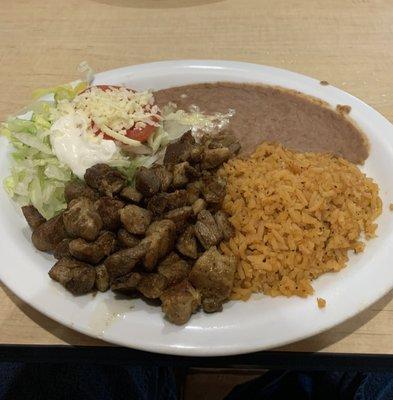 Carnitas plate - meal is accompanied with three tortillas.  Not a lot of flavor