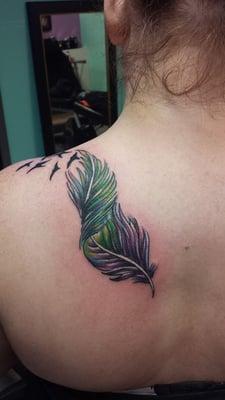 Feather tattoo done by Troy at Fleshtones