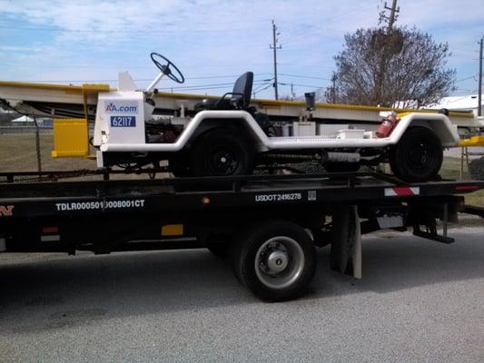 Transporting airline baggage cart