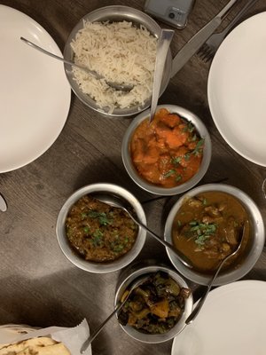 Chicken Tikka Masala, Bhindi Masala, Goat Curry, eggplant dish with peas, Naan, Rice