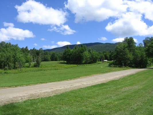 Gorgeous mountain backdrops with neatly manicured fairways and greens.