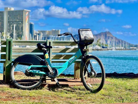 Bike Bike in front of Diamond Head and the Hilton Hawaiian Village from Ala Moana Beach Park.