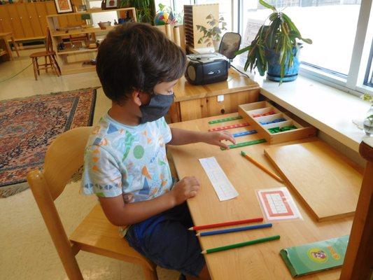 Children's House classroom. The Stamp Game, addition