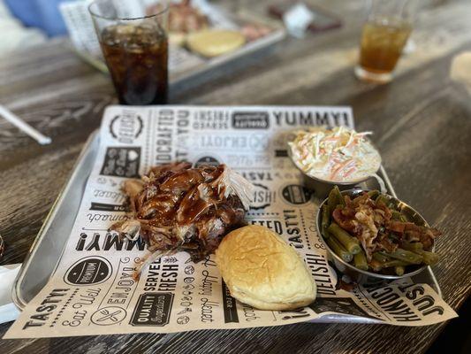 BBQ Pork Platter with Coleslaw and Green Beans.