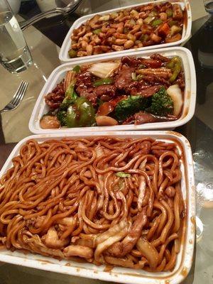 (From front to back) Chicken Lo mein, beef with mixed vegetables, and shrimp with cashews