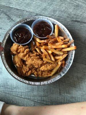 I'm this photo is the chicken strips and fries with barbecue sauce