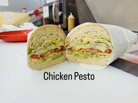 #20 Chicken Pesto (northbay spread, pesto, chicken, lettuce, tomatoes, onions on our freshly baked sourdough roll with pickle on the side)