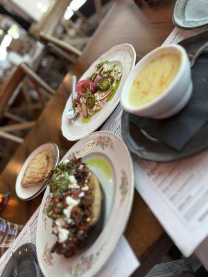 Lamb stuffed eggplant, smoked fish dip, avgolemono soup.