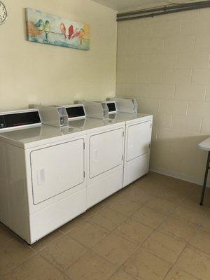 Laundry room with Speed Queen washers/dryers and iron