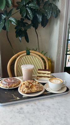 cinnamon roll, almond croissant, latte, iced chai, tiramisu