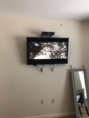 TV, cable box, & mirror left behind in old unit.