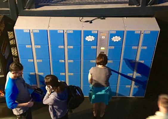 To ride the SLE, you must store bags/purses in lockers; first 2 hours are free.  Make a note of your locker number & combo