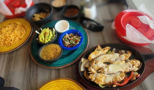 The chicken fajita plate,  fresh guacamole, rice and beans super tasty.