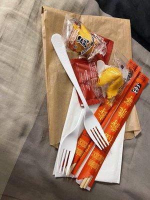 Utensils and fortune cookies with delivery