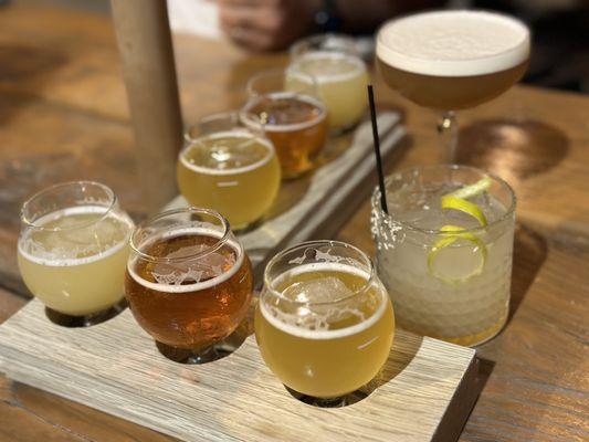 Beer flight, mix of Pilsner, hazy IPA, cocktails