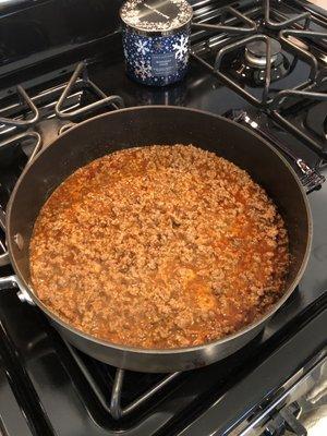 Ground beef, added taco seasoning, extra chili powder to the leftover rice that I added pico de gallo and chili de arbol to.