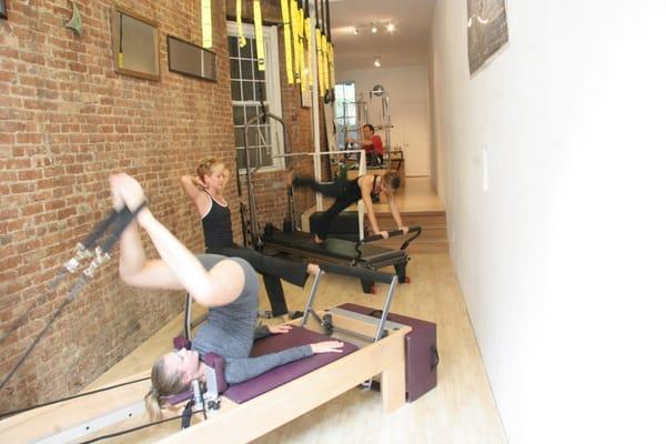 Group Pilates equipment classes