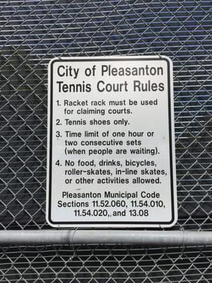 Apparently tennis court rules are written into the city's municipal code