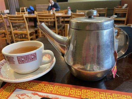 Class pot of tea and cup n saucer. Civilized.