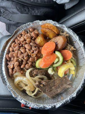 Rice and beans, veggies, bistec encebollado, pernil and maduros