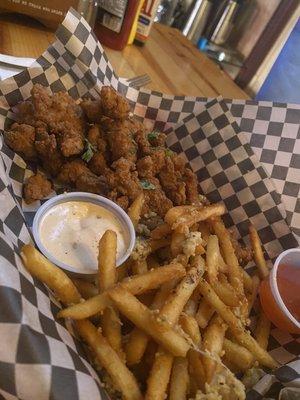 Popcorn chicken and Garlic fries. Dipping sauces for the win....siriacha ranch and sweet sauce!