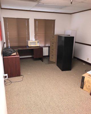 Desk and file cabinets removed