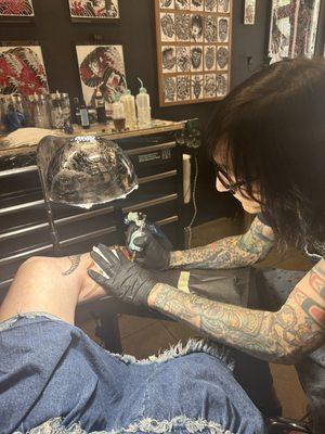 @jakecavaliere tattooing a Baphomet leg piece