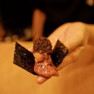 the perfect one biter sushi A 5 wagyu Hokkaido uni and winter black truffle