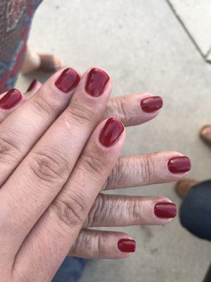 Mom and me. Her's are perfect, mine are not bad but the gel run to the tip of the nail making it look bulky.