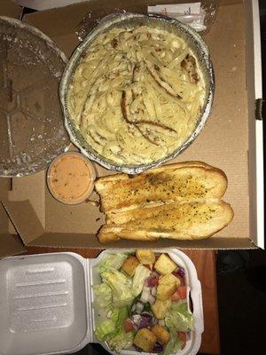 Chicken Alfredo with breadsticks and a side salad this is my second time having it