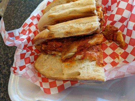 A pretty empty chicken parm sandwich.