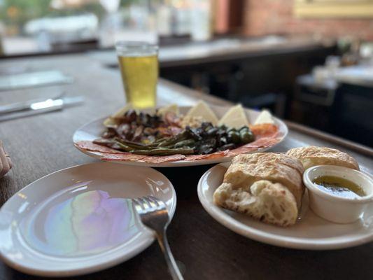 Amazing bread, appetizer plate, service, beer!