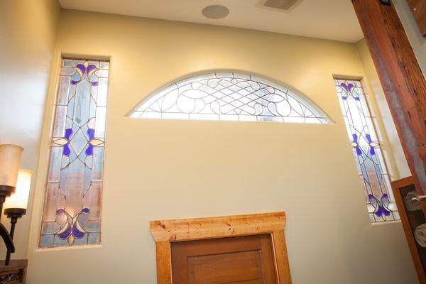 Master bathroom with antique stained glass