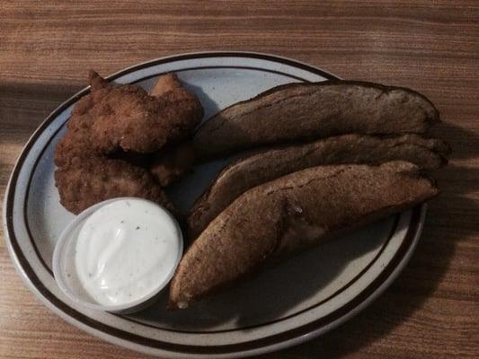 Chicken strips with jo-jos and a side of ranch.