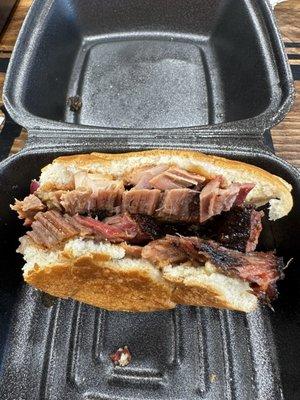 Sliced lean brisket sandwich!  I was struggling between wanting to scarf it down and snapping a pic to post a review.