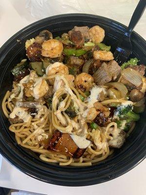 Shrimp-steak bowl with noodles. Best yum yum sauce I've ever had!