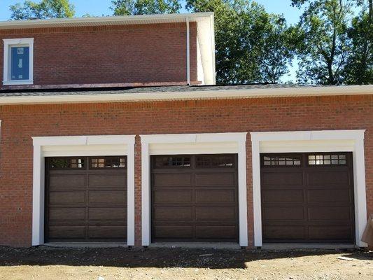 Windmere Model WF Insulated Carriage House Style Garage Door with Natural Wood appearance comes with a lifetime warranty...