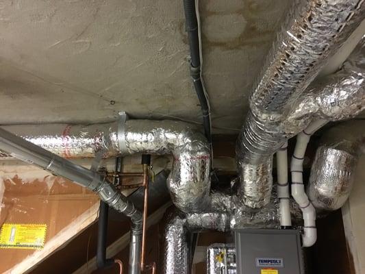 Photo of a portion of the new pipe and duct work done by Ace Heating & Air Conditioning.