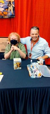 Maile Flanagan signing Naruto Funko pop at Anime Riverside 2022.