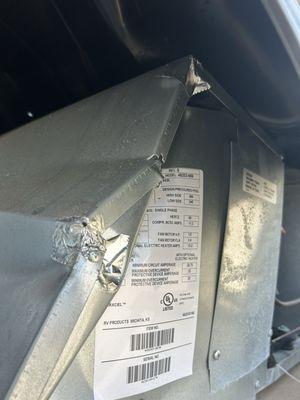 Smashed AC that they sold me with a new shroud put over it.